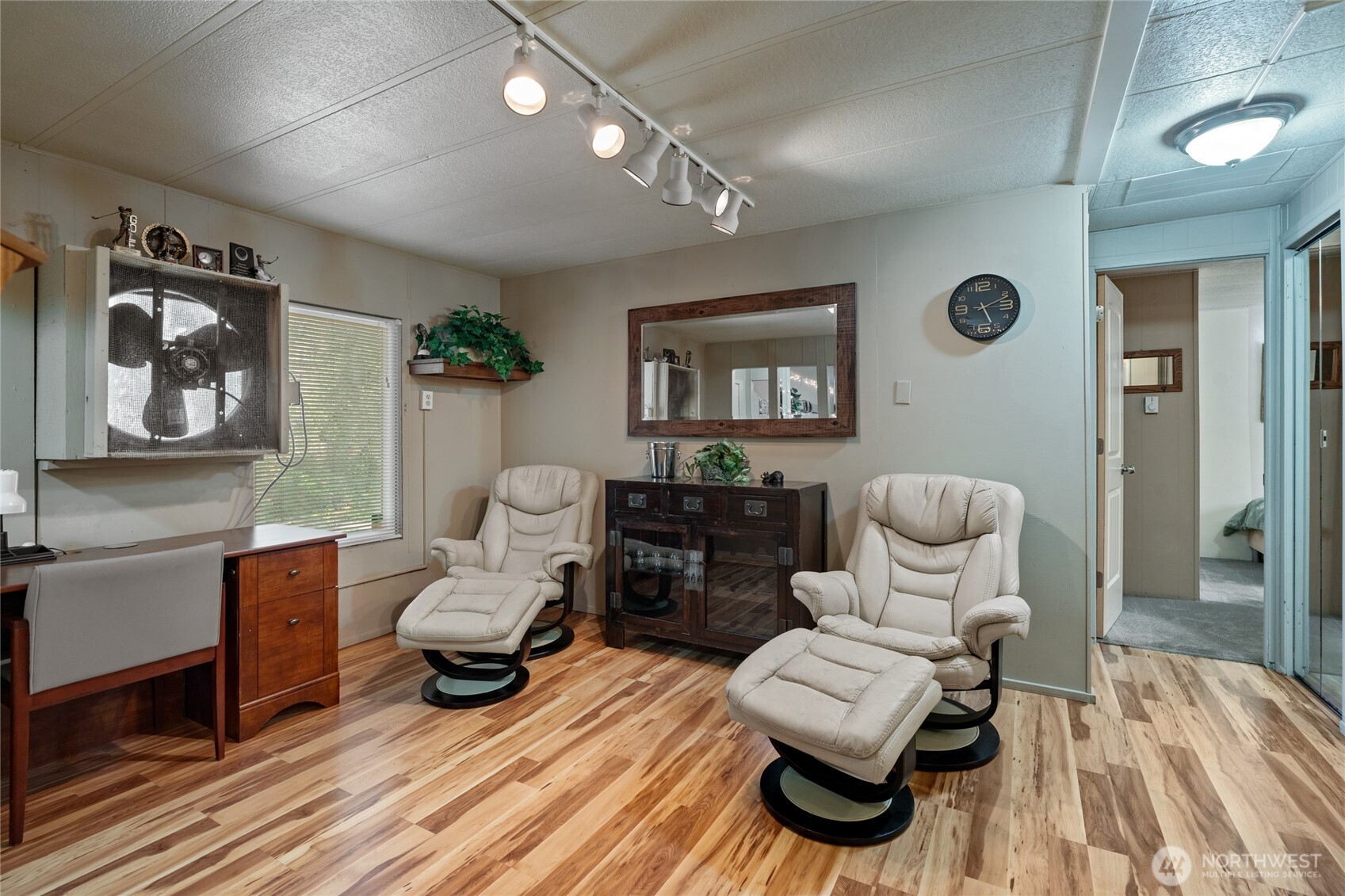 271 Skate Creek Road North Ashford, WA 98304 - Photo 10 of 40 a living room with furniture and wooden floor