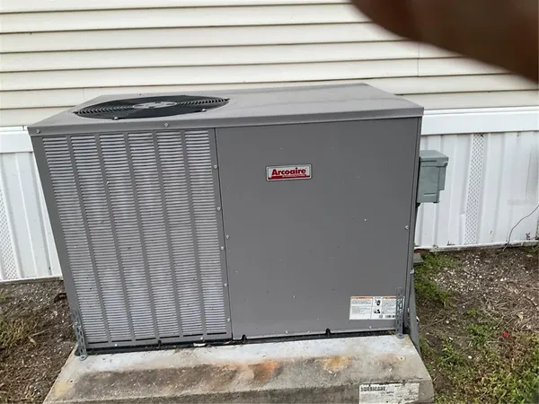 a house view with a garden space
