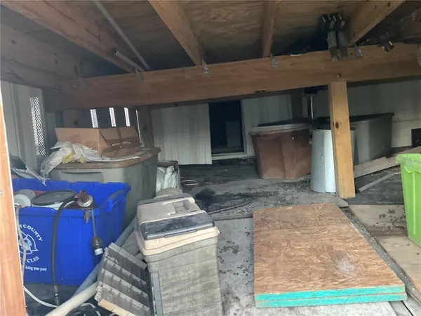 a room with a fireplace and pool table