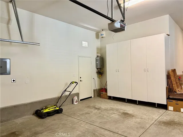 a room with chairs and washer