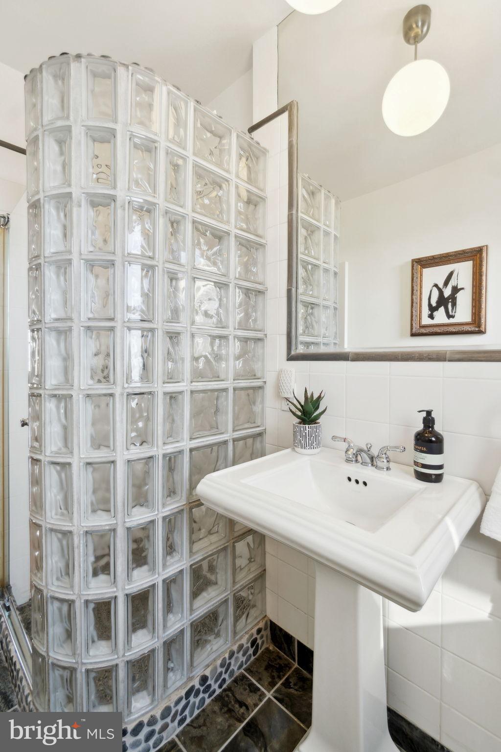 1901 Columbia Road Northwest, Unit 805 Washington, DC 20009 - Photo 14 of 37 a view of a dining room with furniture and wooden floor