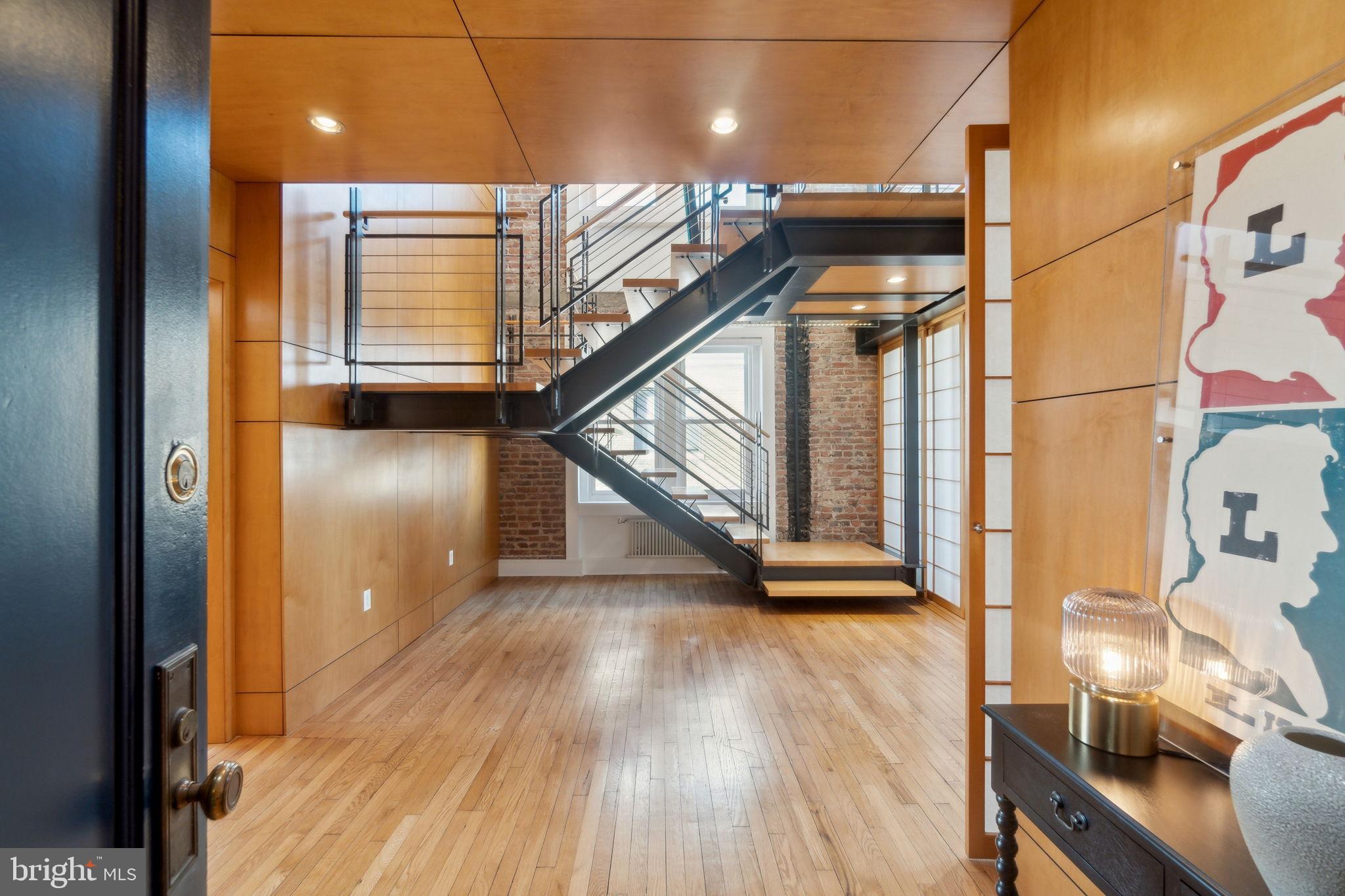 1901 Columbia Road Northwest, Unit 805 Washington, DC 20009 - Photo 2 of 37 a view of entryway with wooden floor