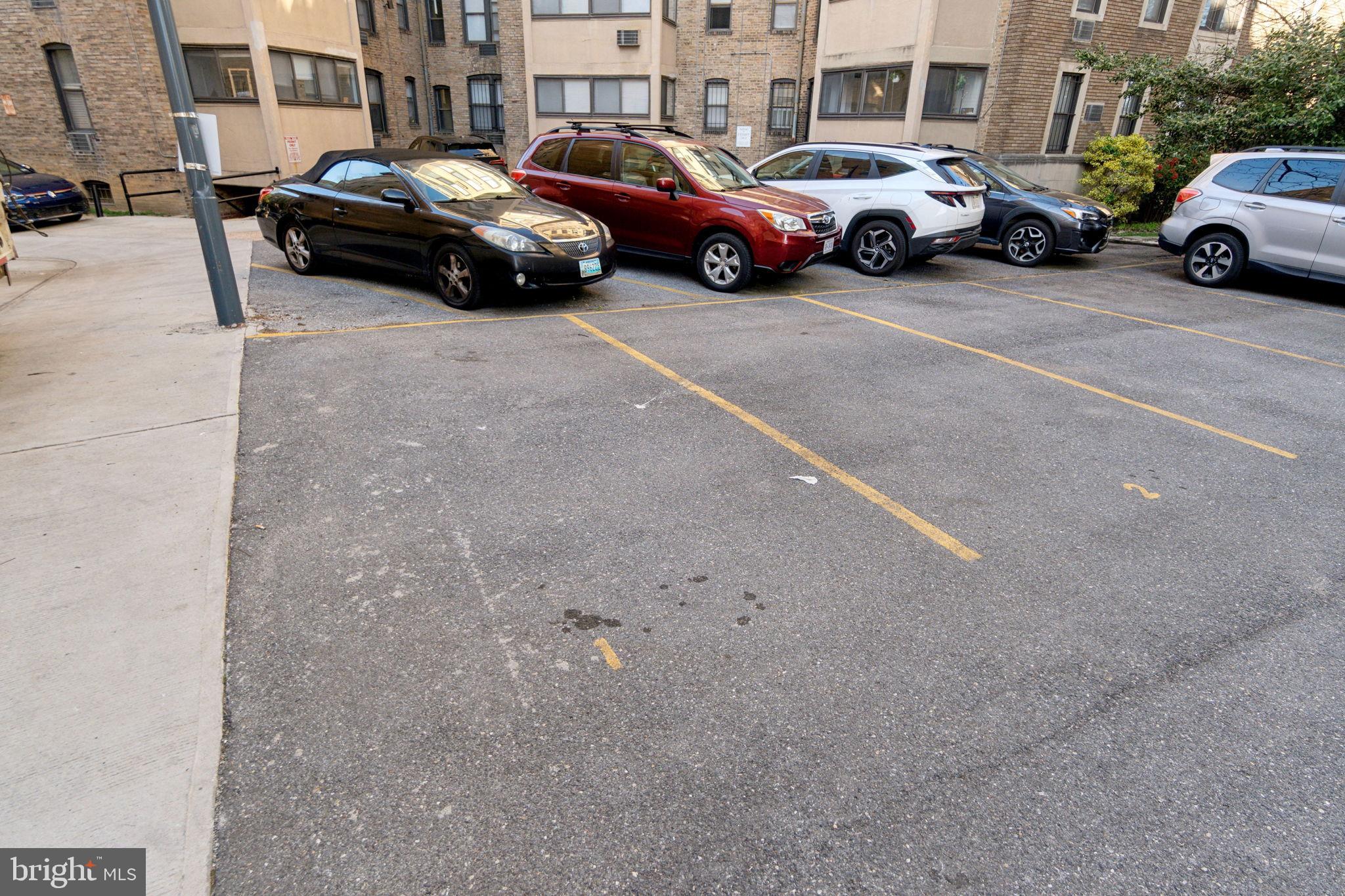 1901 Columbia Road Northwest, Unit 805 Washington, DC 20009 - Photo 27 of 37 a cars parked on the side of a street