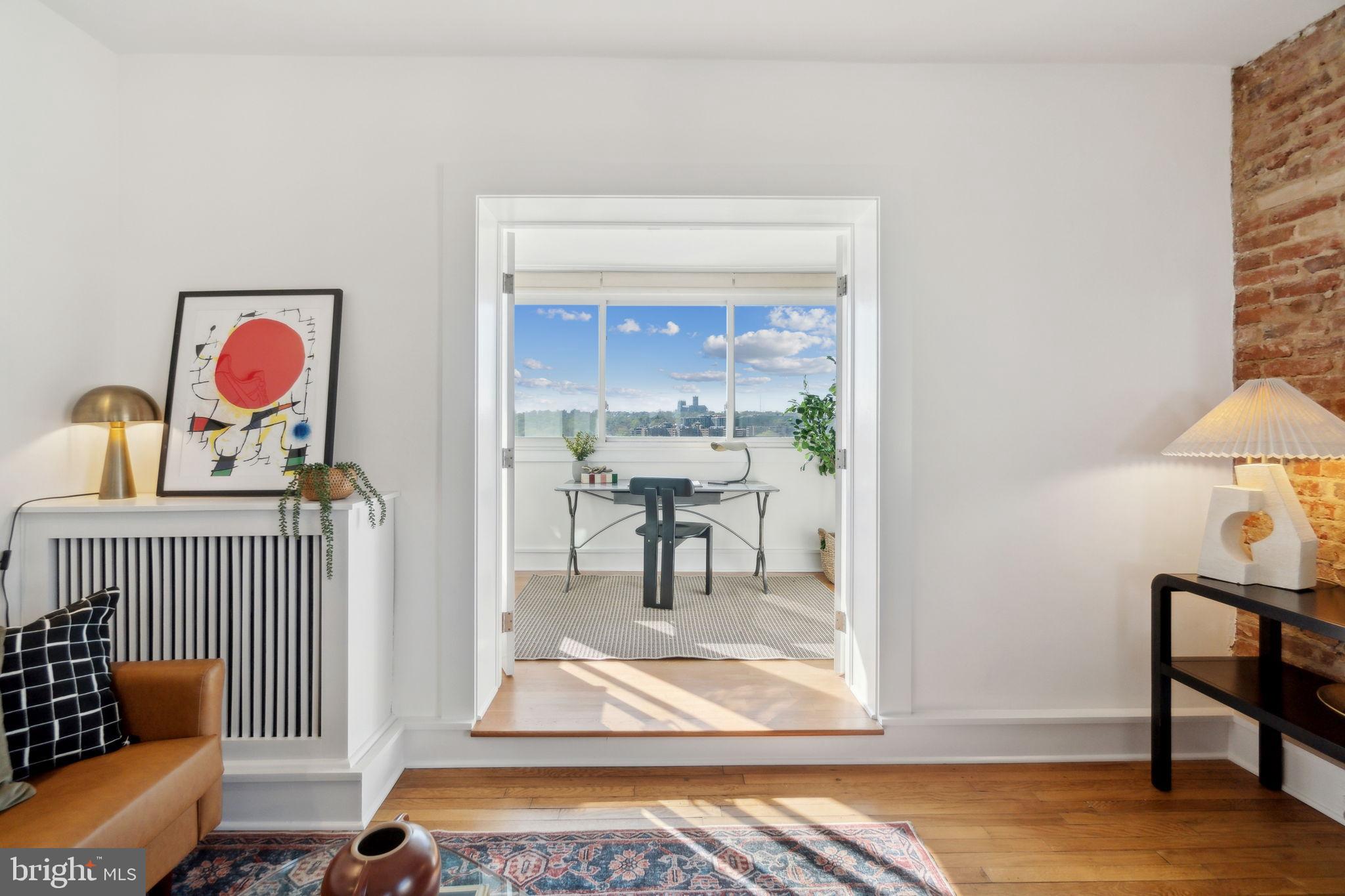 1901 Columbia Road Northwest, Unit 805 Washington, DC 20009 - Photo 6 of 37 a view of dining room and hall with furniture