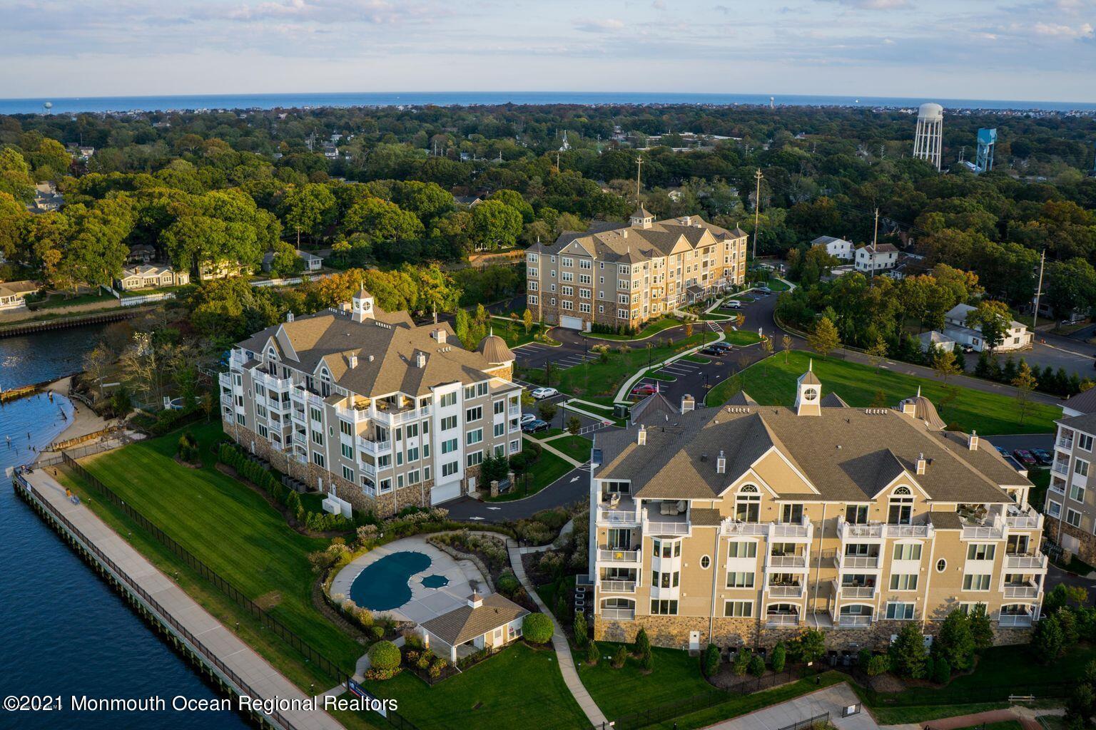 2201 River Road, Unit 3202 Point Pleasant, NJ 08742 - Photo 1 of 44 aerial view of a house with a garden