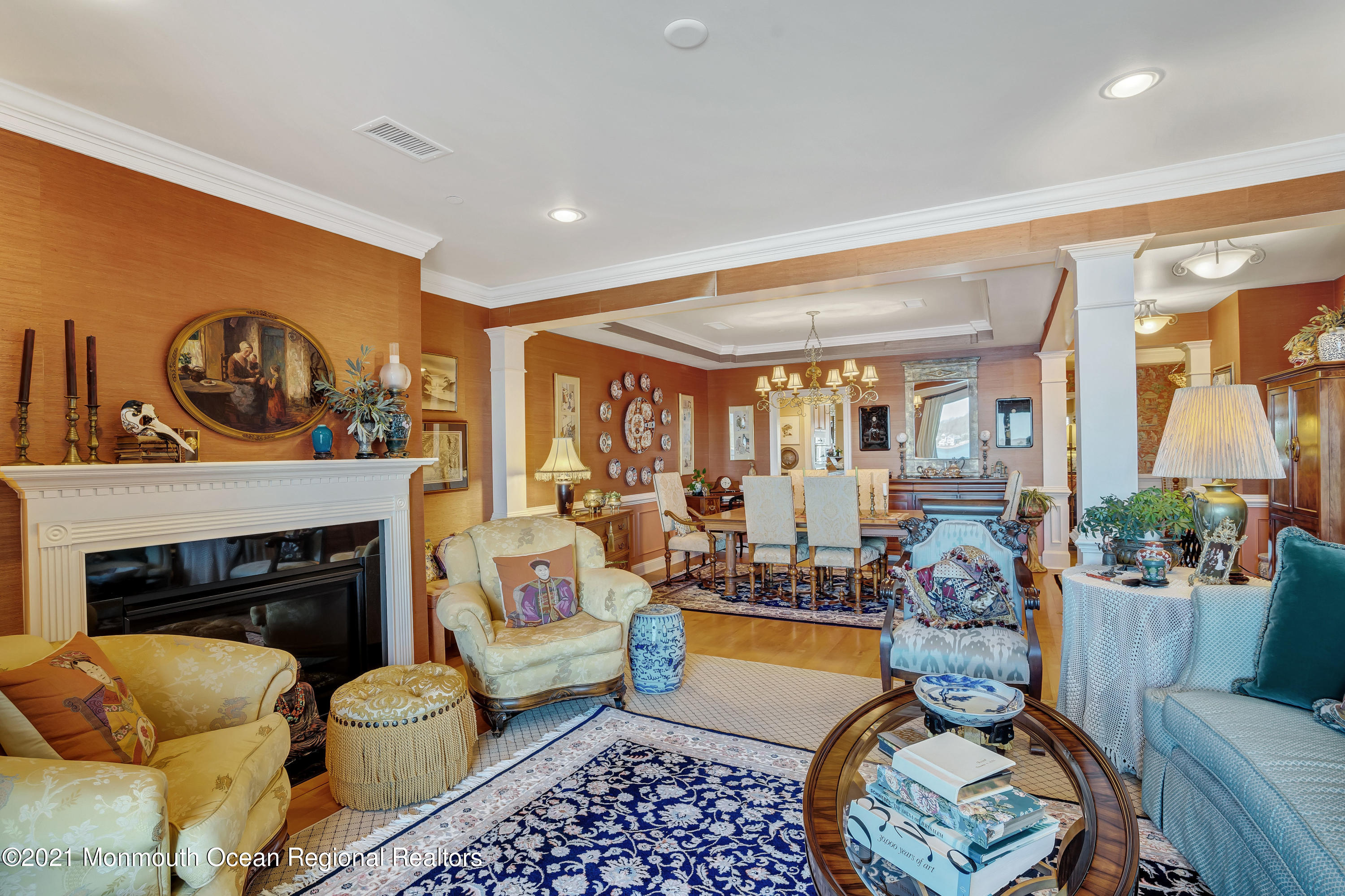 2201 River Road, Unit 3202 Point Pleasant, NJ 08742 - Photo 11 of 44 a living room with furniture and a fireplace
