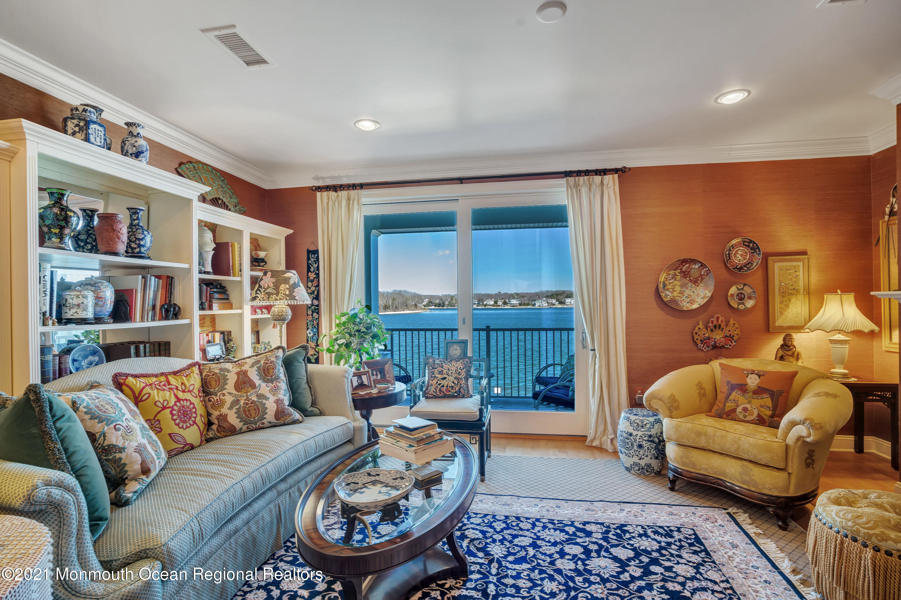 2201 River Road, Unit 3202 Point Pleasant, NJ 08742 - Photo 13 of 44 a living room with furniture and a book shelf