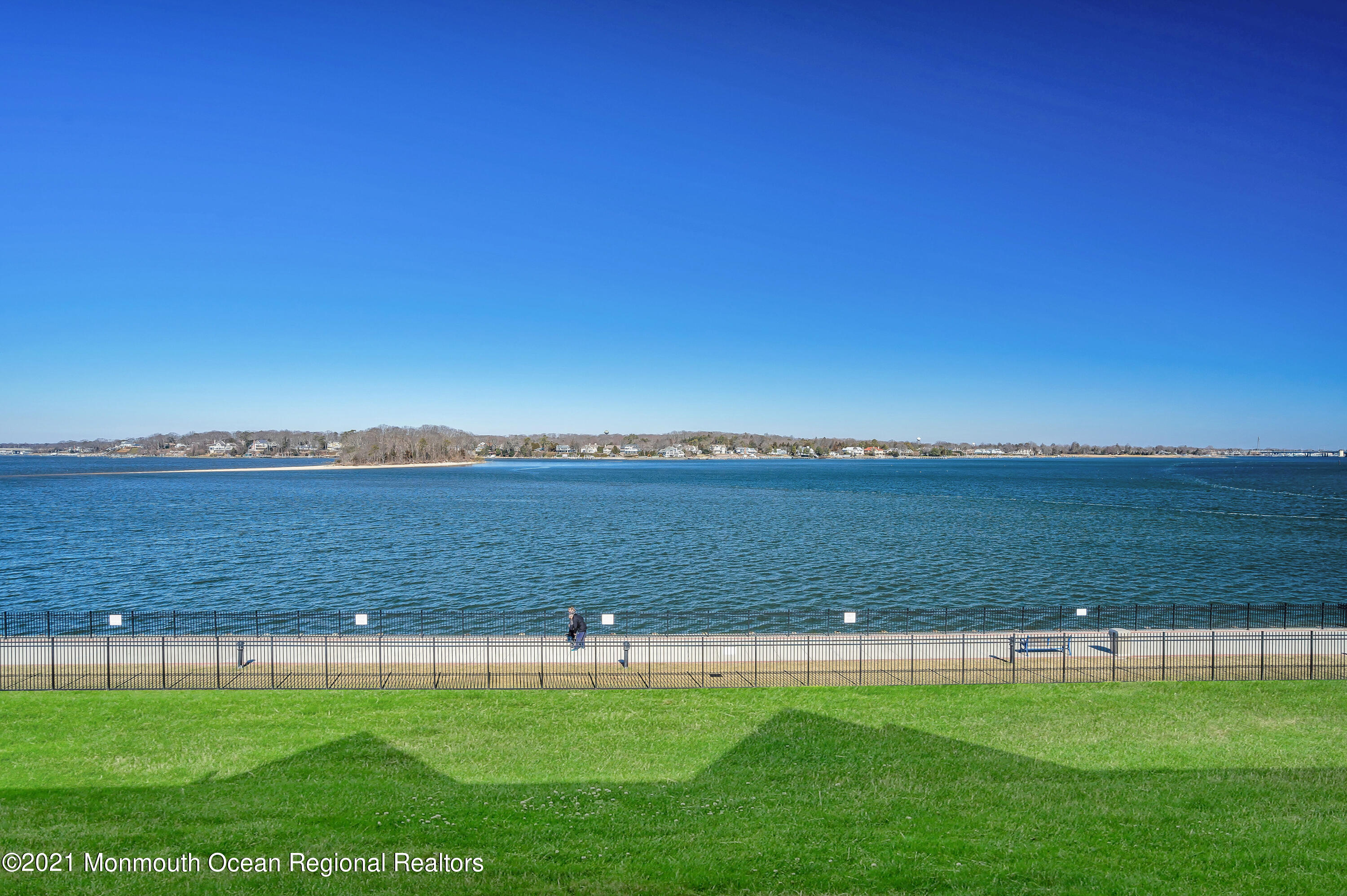 2201 River Road, Unit 3202 Point Pleasant, NJ 08742 - Photo 15 of 44 a view of a lake with a yard