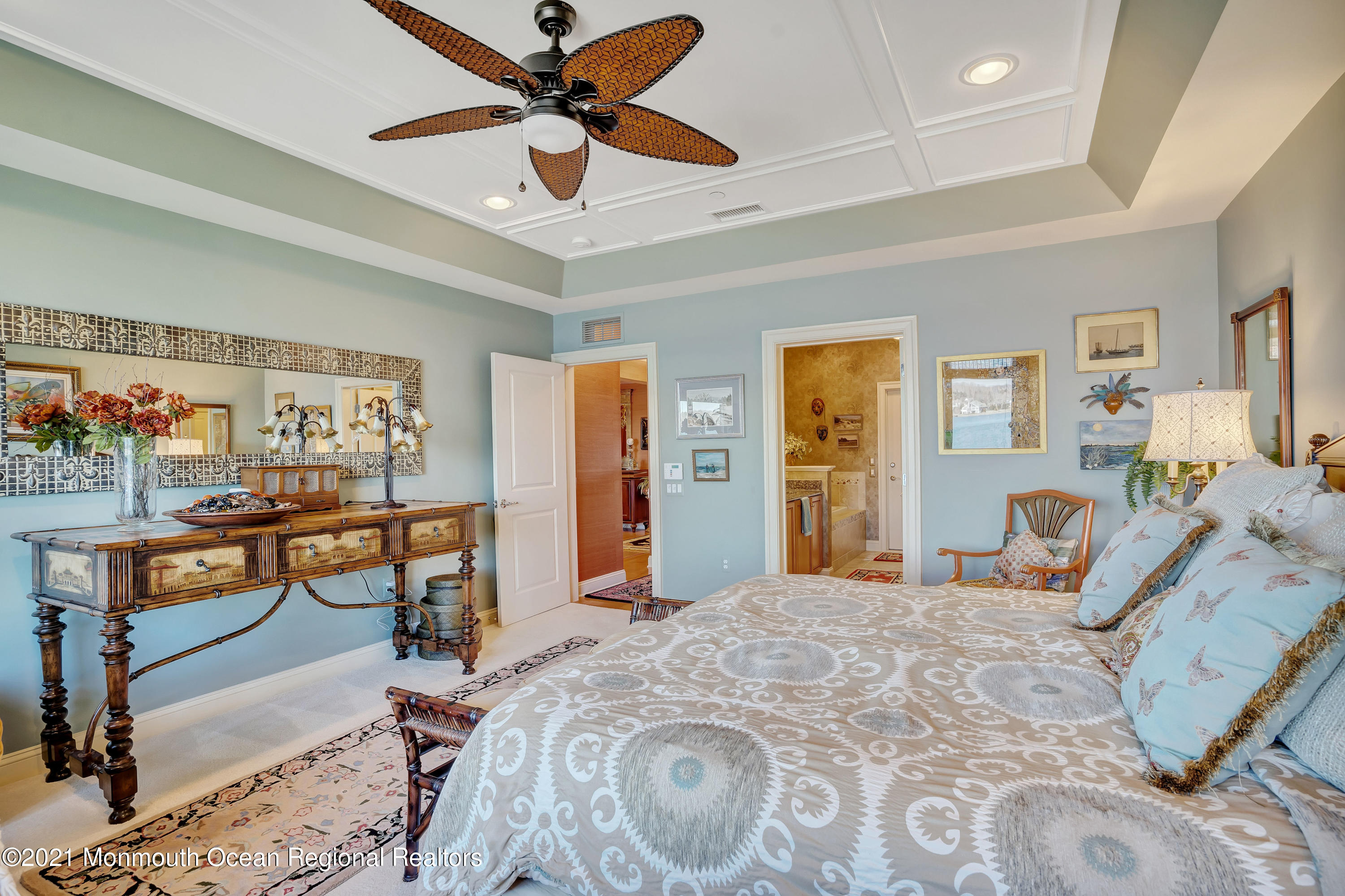 2201 River Road, Unit 3202 Point Pleasant, NJ 08742 - Photo 17 of 44 a bedroom with a bed and wooden floor