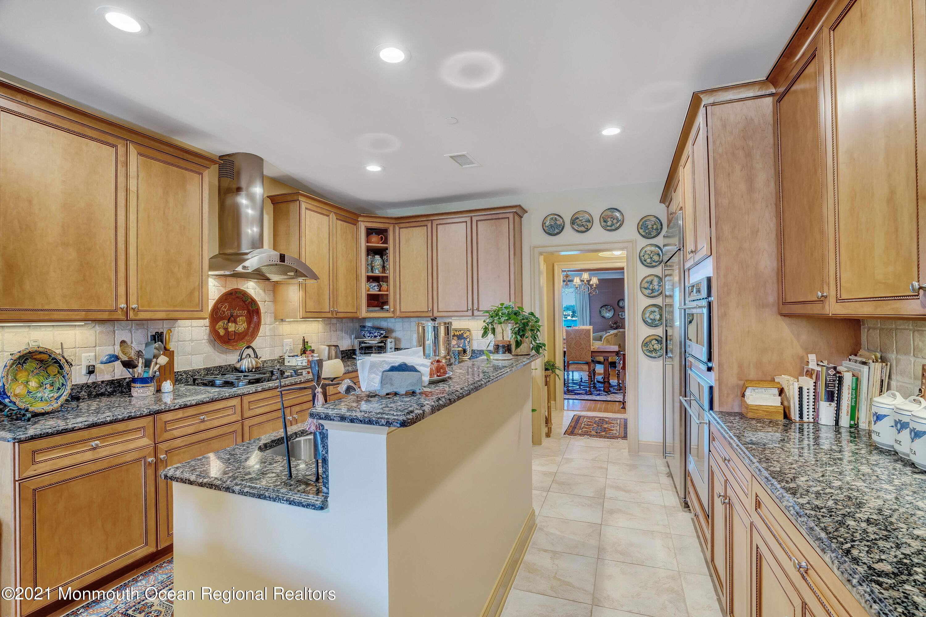2201 River Road, Unit 3202 Point Pleasant, NJ 08742 - Photo 27 of 44 a kitchen with stainless steel appliances granite countertop a sink stove and cabinets
