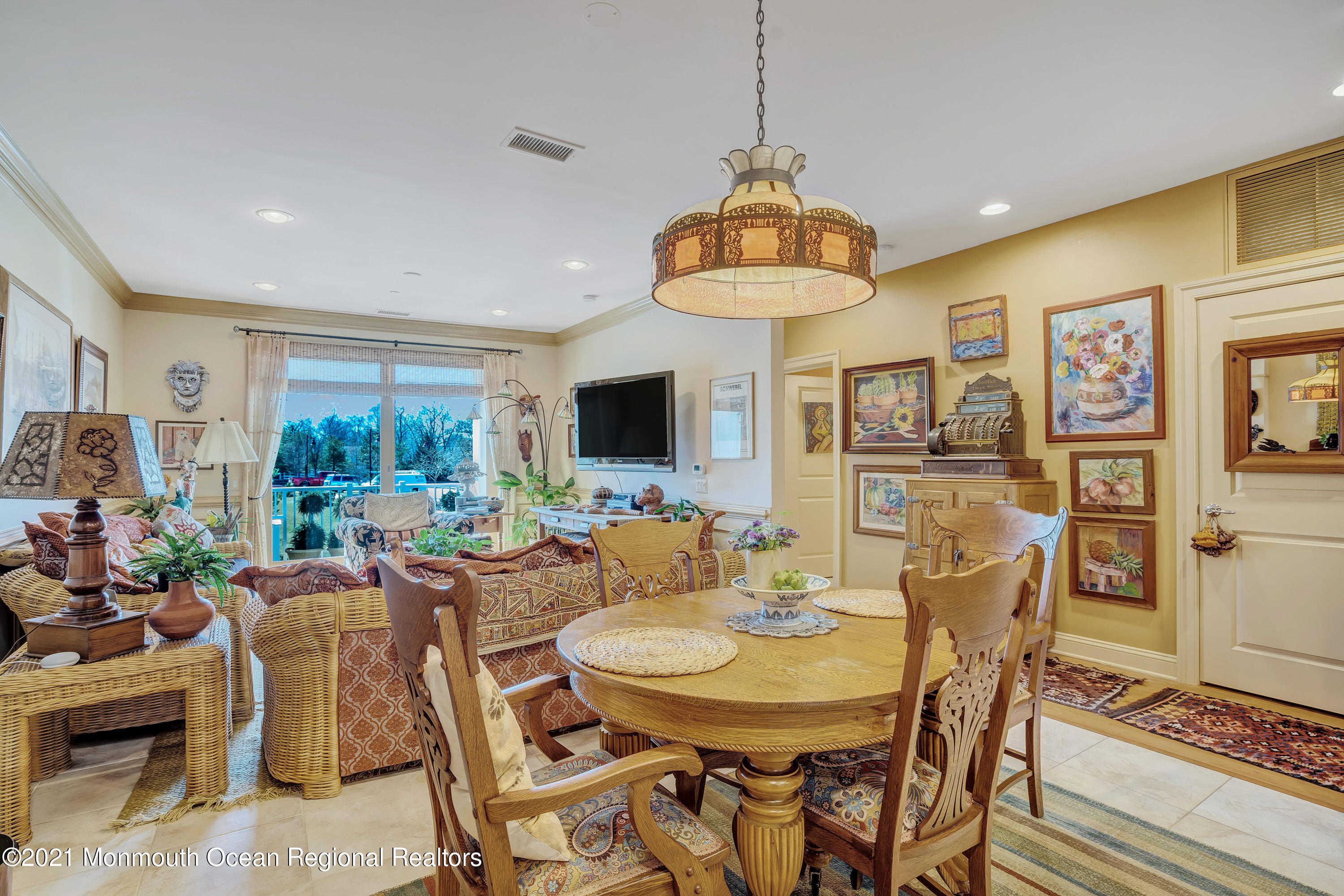 2201 River Road, Unit 3202 Point Pleasant, NJ 08742 - Photo 28 of 44 a view of a dining room with furniture window and wooden floor