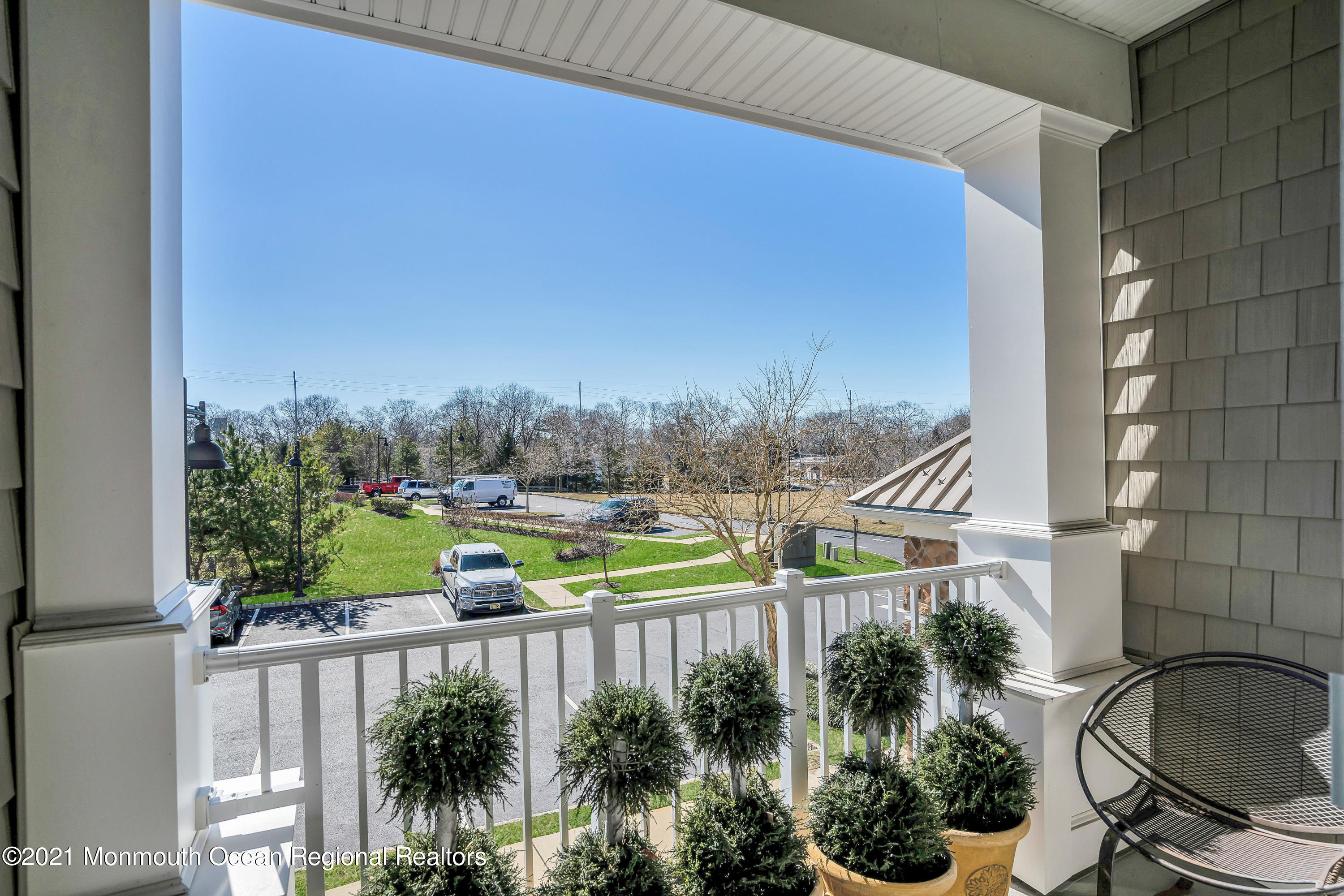 2201 River Road, Unit 3202 Point Pleasant, NJ 08742 - Photo 31 of 44 a view of a balcony with an outdoor seating