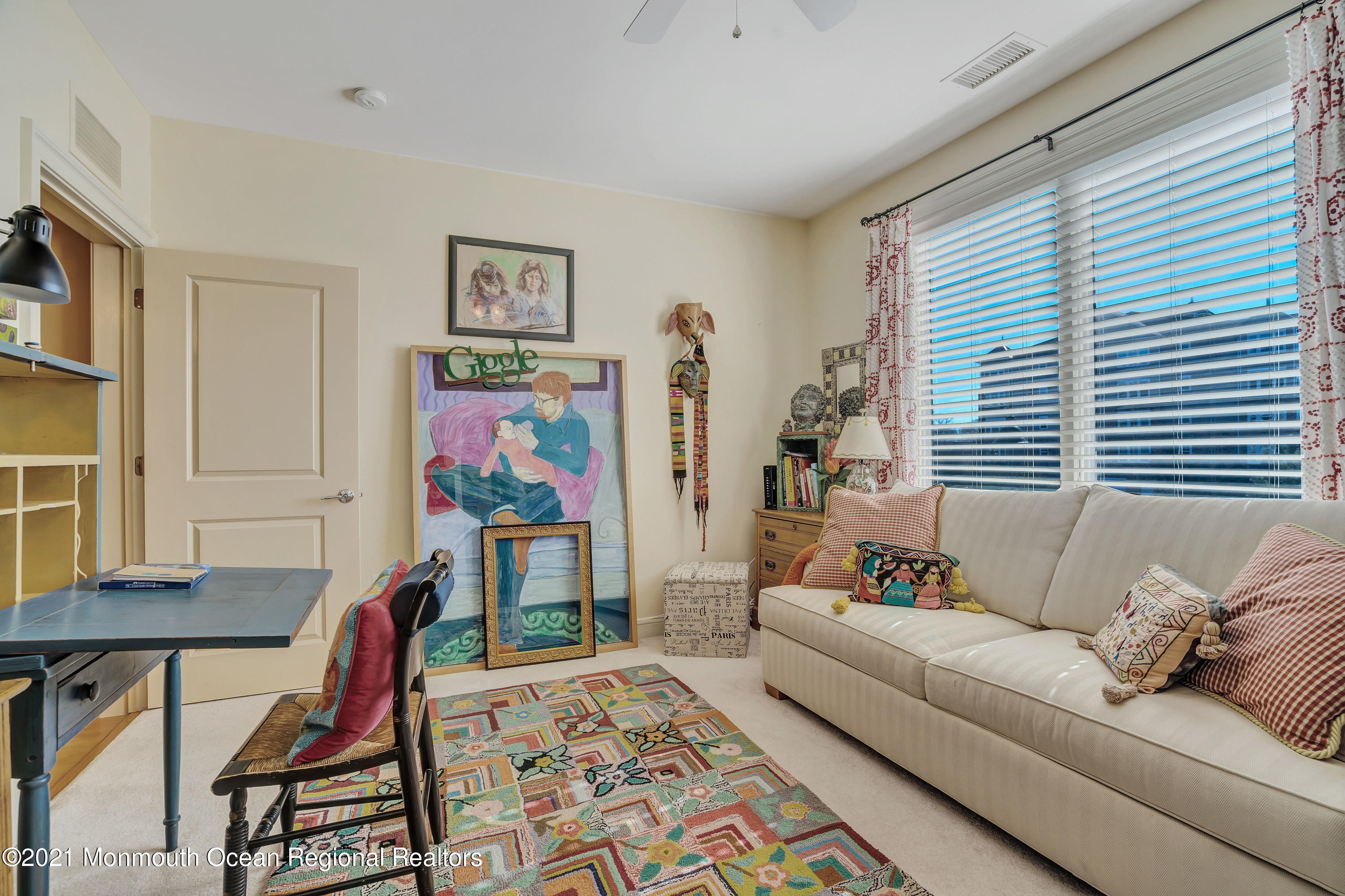 2201 River Road, Unit 3202 Point Pleasant, NJ 08742 - Photo 33 of 44 a living room with furniture and a window