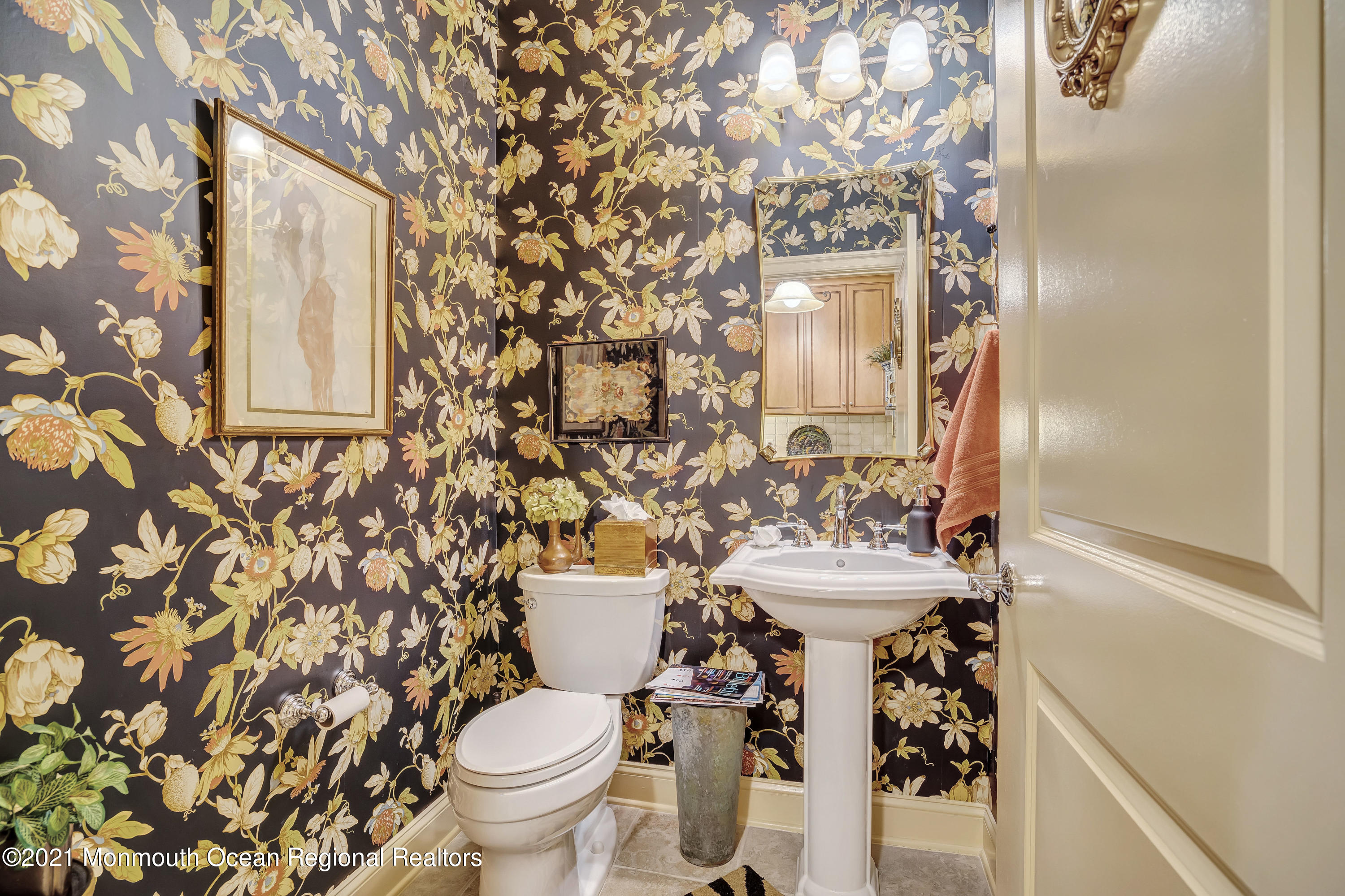 2201 River Road, Unit 3202 Point Pleasant, NJ 08742 - Photo 37 of 44 a bathroom with a sink and mirror with toilet