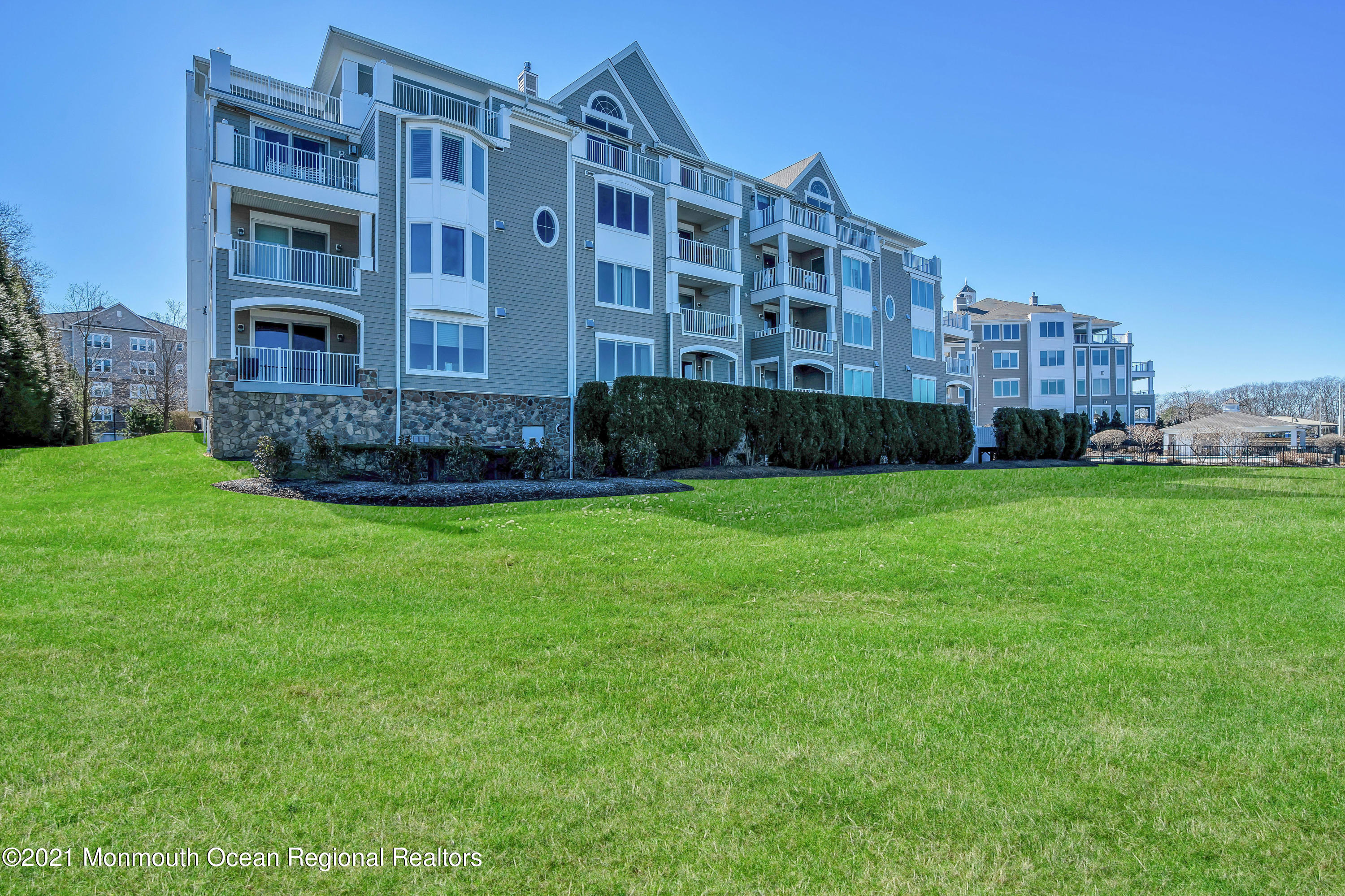 2201 River Road, Unit 3202 Point Pleasant, NJ 08742 - Photo 38 of 44 a view of building with garden