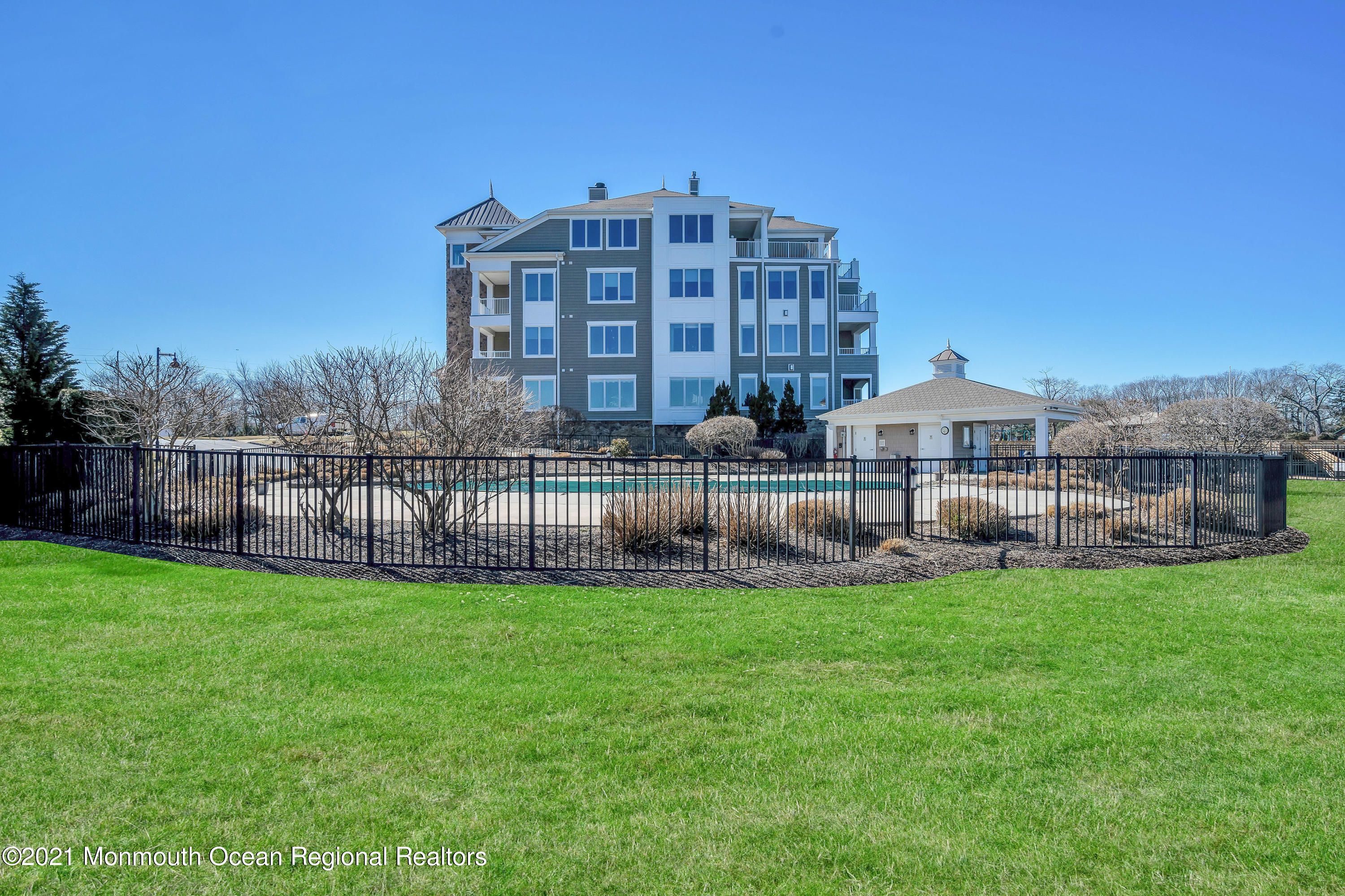 2201 River Road, Unit 3202 Point Pleasant, NJ 08742 - Photo 40 of 44 a view of a house with a yard and sitting area