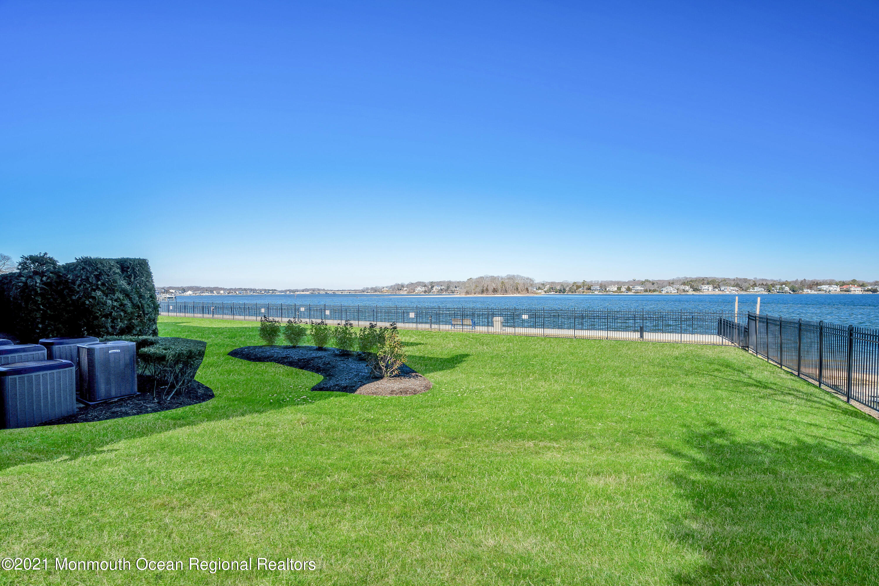 2201 River Road, Unit 3202 Point Pleasant, NJ 08742 - Photo 42 of 44 a view of a river and outdoor space