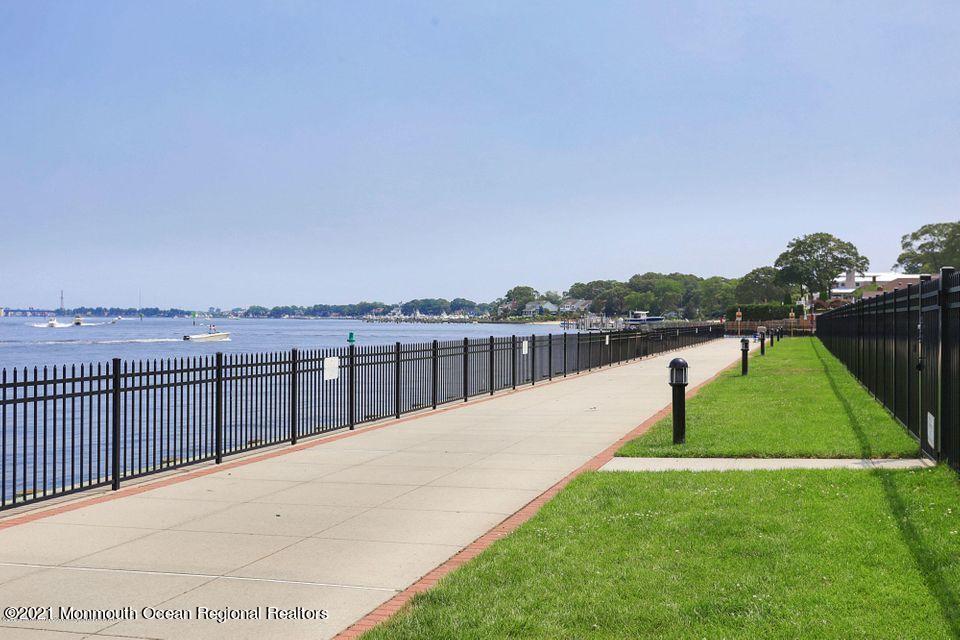 2201 River Road, Unit 3202 Point Pleasant, NJ 08742 - Photo 43 of 44 a view of a terrace with a garden