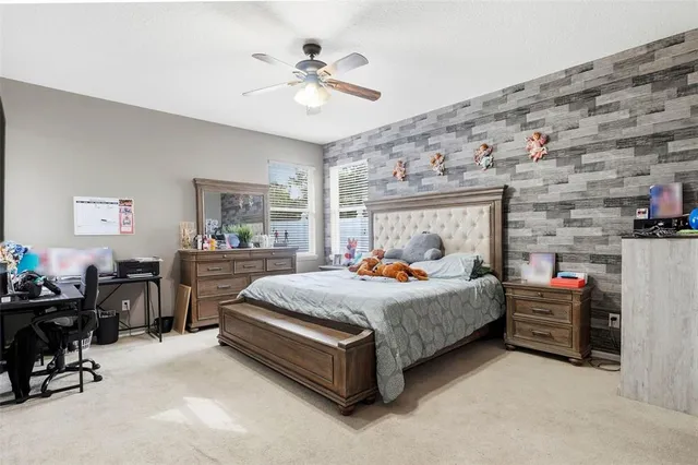 a bed room with a bed and furniture