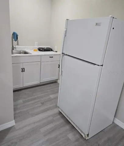 a utility room with washer and dryer
