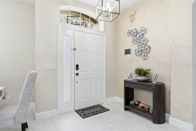 a view of room with furniture and wooden floor