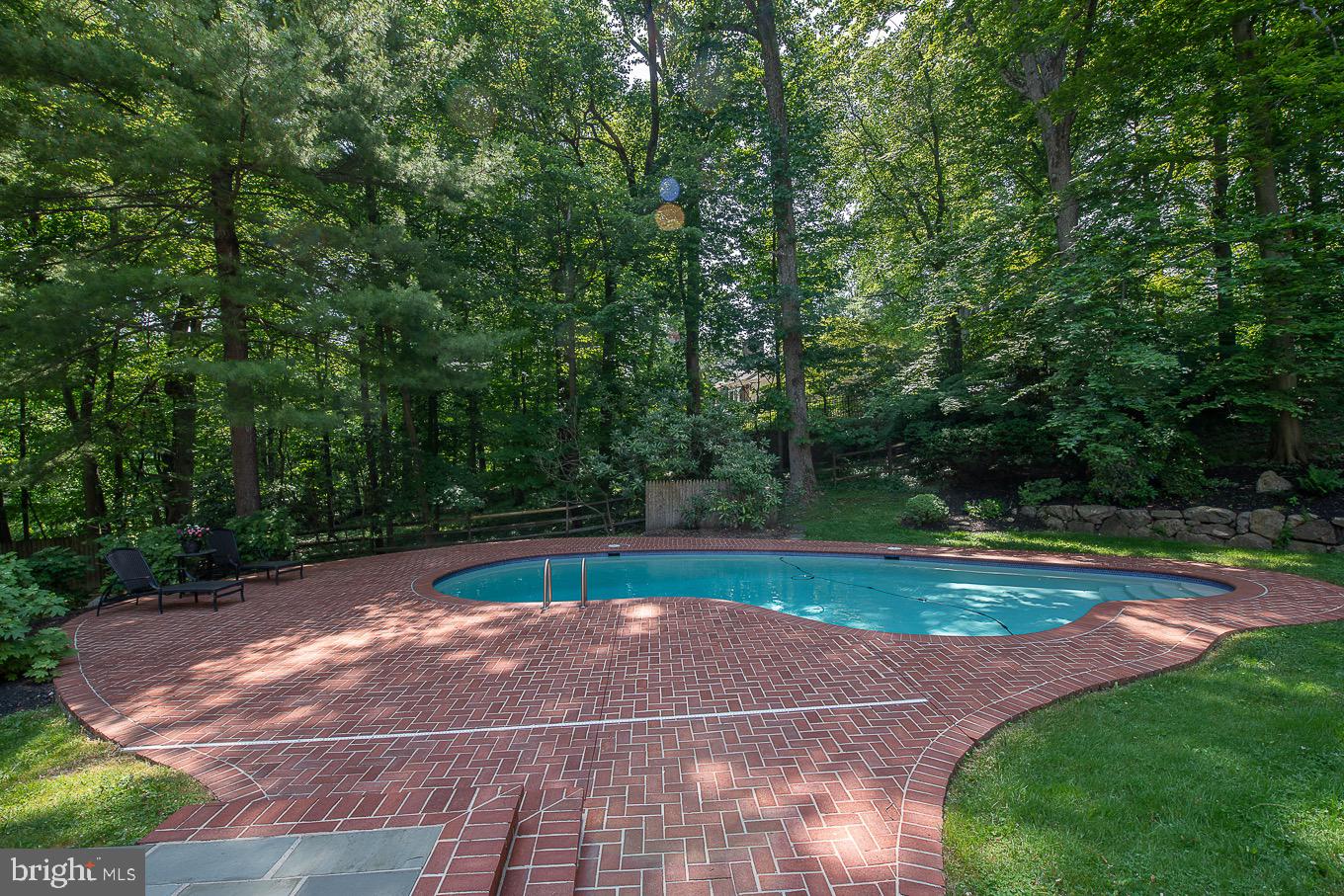 714 Woodcrest Road Wayne, PA 19087 - Photo 39 of 44 Welcoming Pool with brick surround