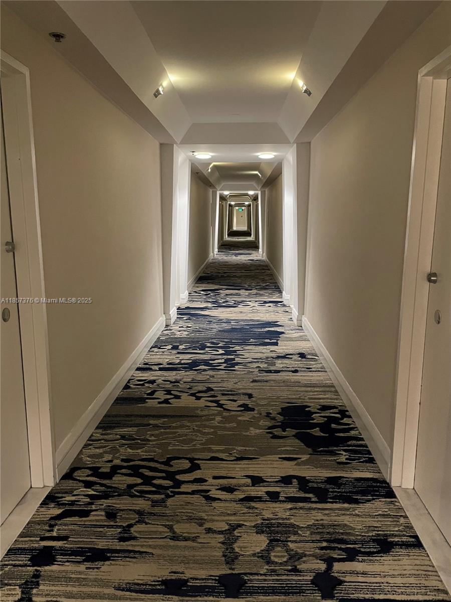 5161 Collins Avenue, Unit 1104 Miami Beach, FL 33140 - Photo 15 of 19 a view of an empty room