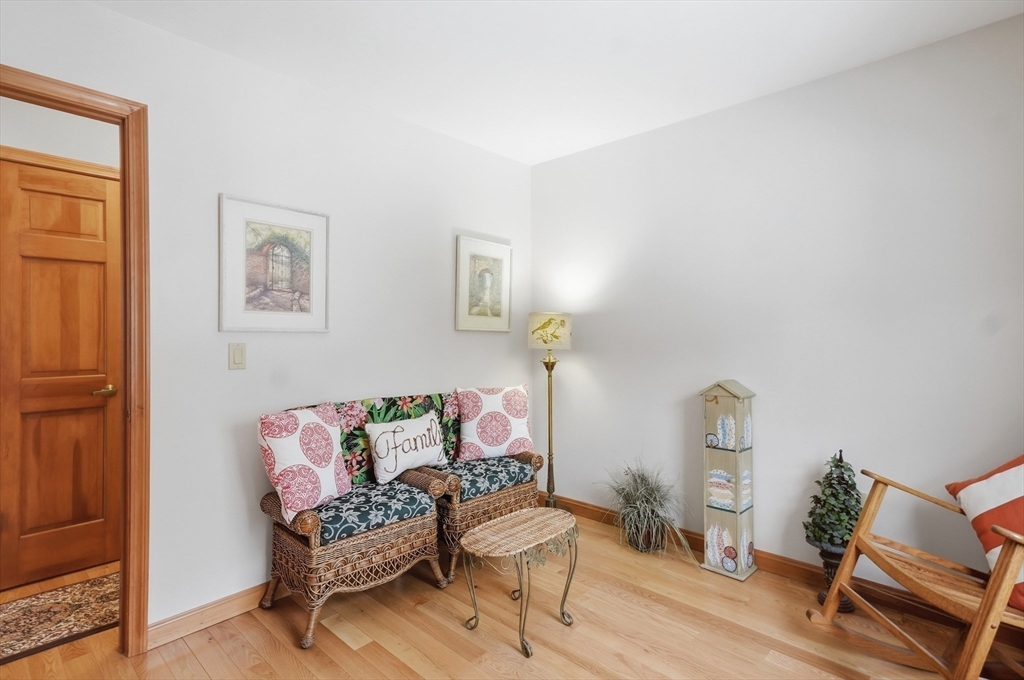 459 North Street Georgetown, MA 01833 - Photo 22 of 42 a living room with furniture and a window