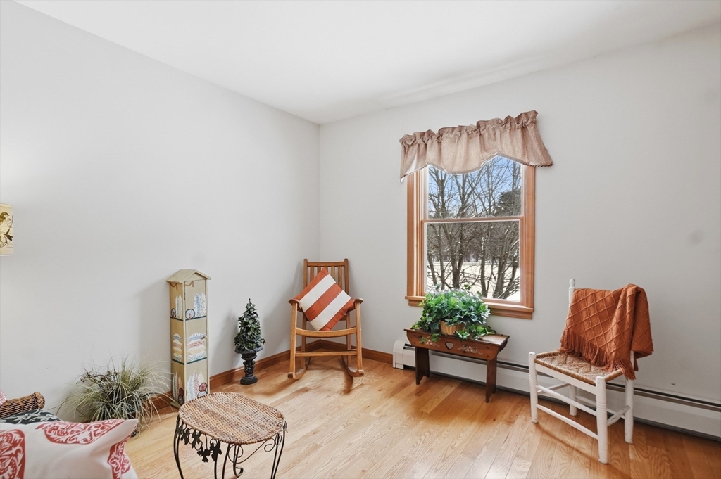 459 North Street Georgetown, MA 01833 - Photo 23 of 42 a living room with furniture and a window
