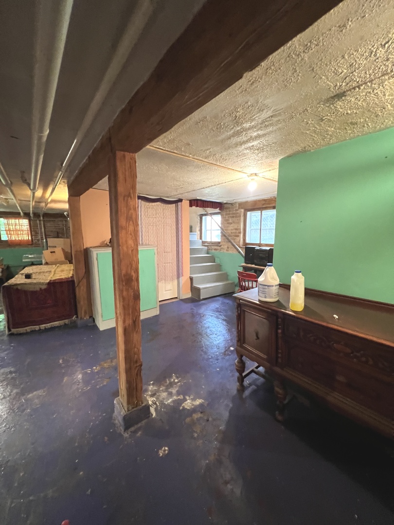 2453 North Tripp Avenue Chicago, IL 60639 - Photo 14 of 17 a living room with furniture a large window