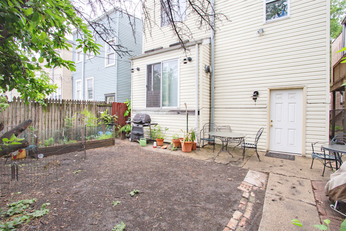 2453 North Tripp Avenue Chicago, IL 60639 - Photo 3 of 17 a view of outdoor space yard and patio
