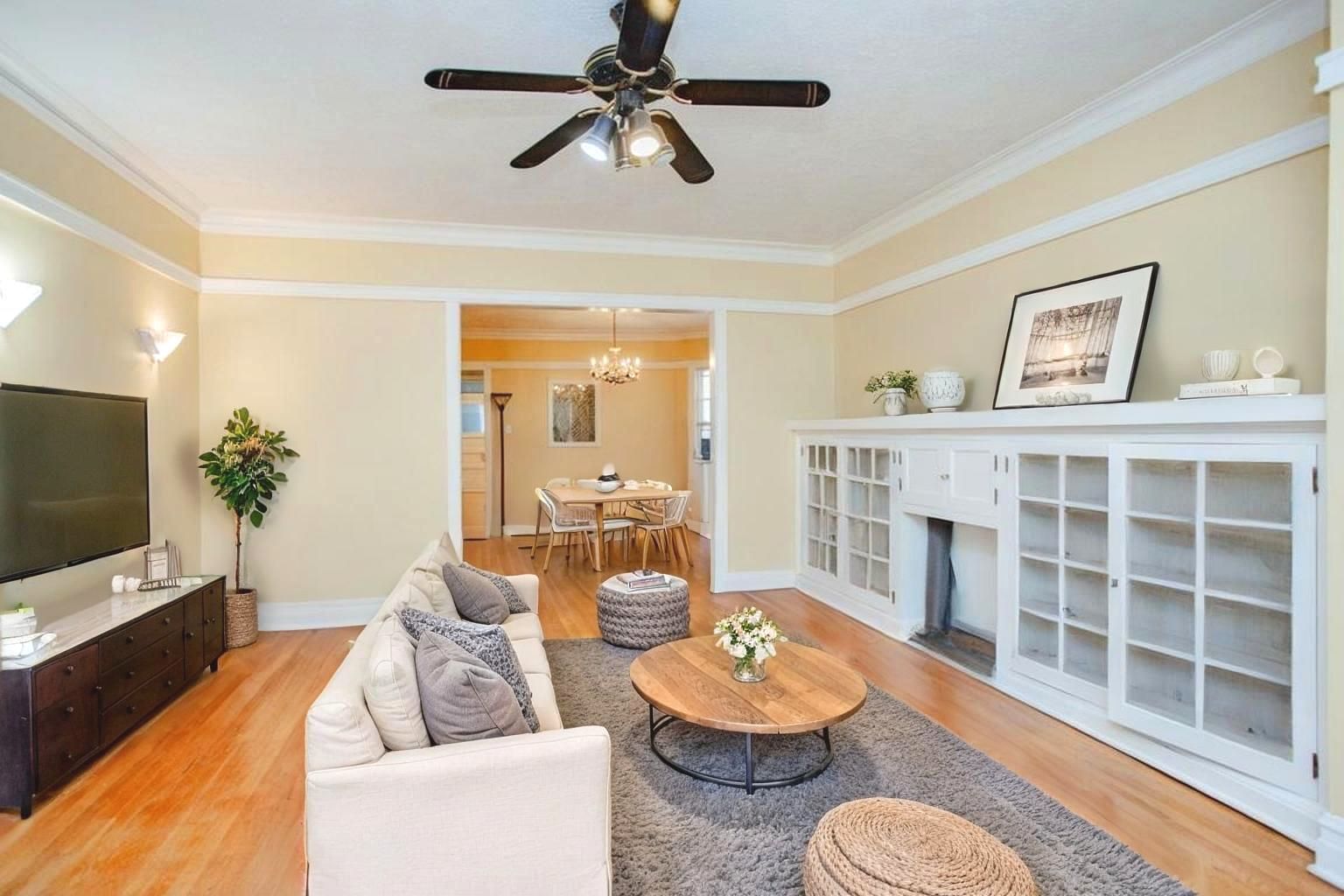 2453 North Tripp Avenue Chicago, IL 60639 - Photo 5 of 17 a living room with furniture and a flat screen tv