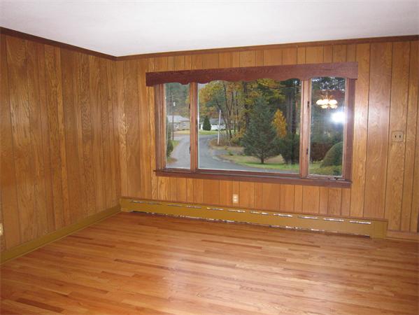 76 Ridgewood Drive Russell, MA 01071 - Photo 11 of 30 a view of a room with wooden floor and a window