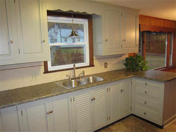 76 Ridgewood Drive Russell, MA 01071 - Photo 15 of 30 a kitchen with granite countertop a sink and cabinets