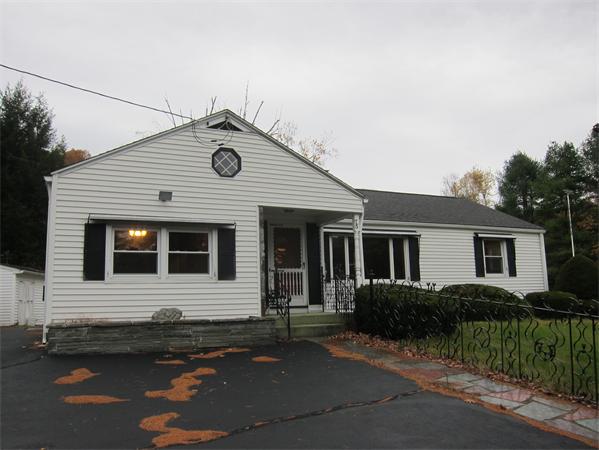 76 Ridgewood Drive Russell, MA 01071 - Photo 2 of 30 a front view of a house with yard
