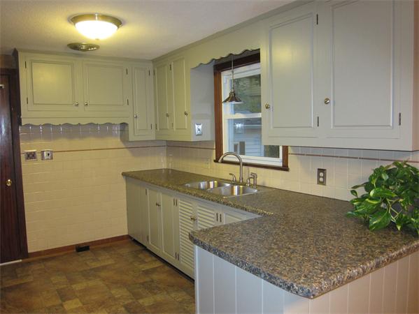 76 Ridgewood Drive Russell, MA 01071 - Photo 3 of 30 a kitchen with a sink and cabinets