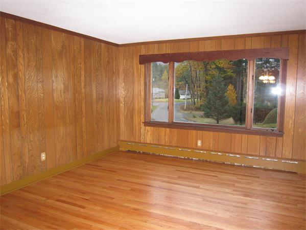 76 Ridgewood Drive Russell, MA 01071 - Photo 10 of 30 a view of a room with wooden floor and a window