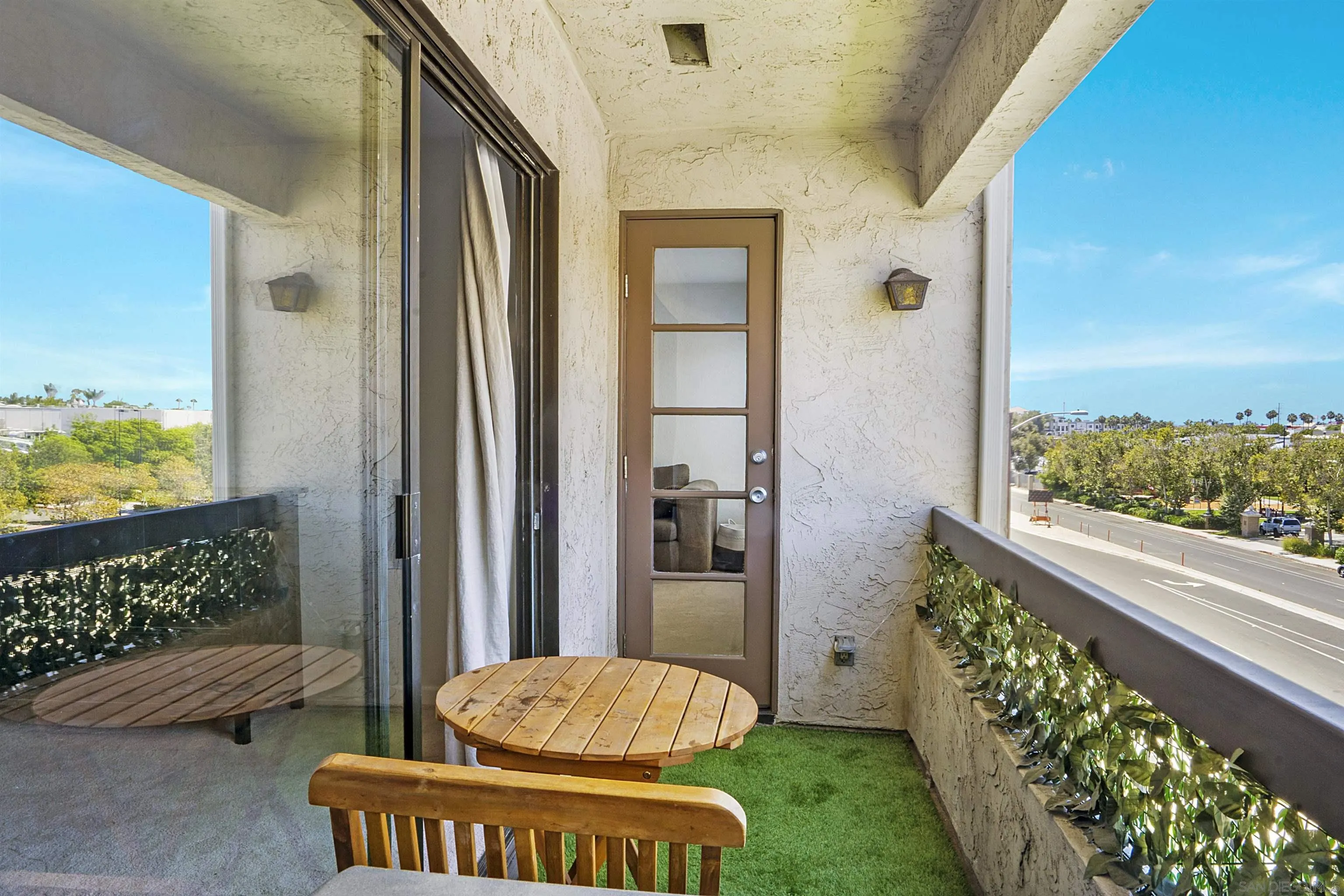5605 Friars Road, Unit 304 San Diego, CA 92110 - Photo 20 of 37 a view of porch with a bench