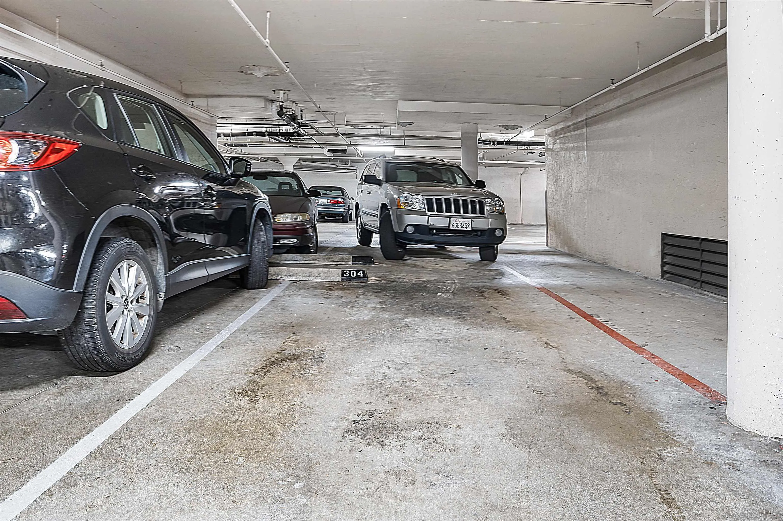 5605 Friars Road, Unit 304 San Diego, CA 92110 - Photo 23 of 37 a view of car parking