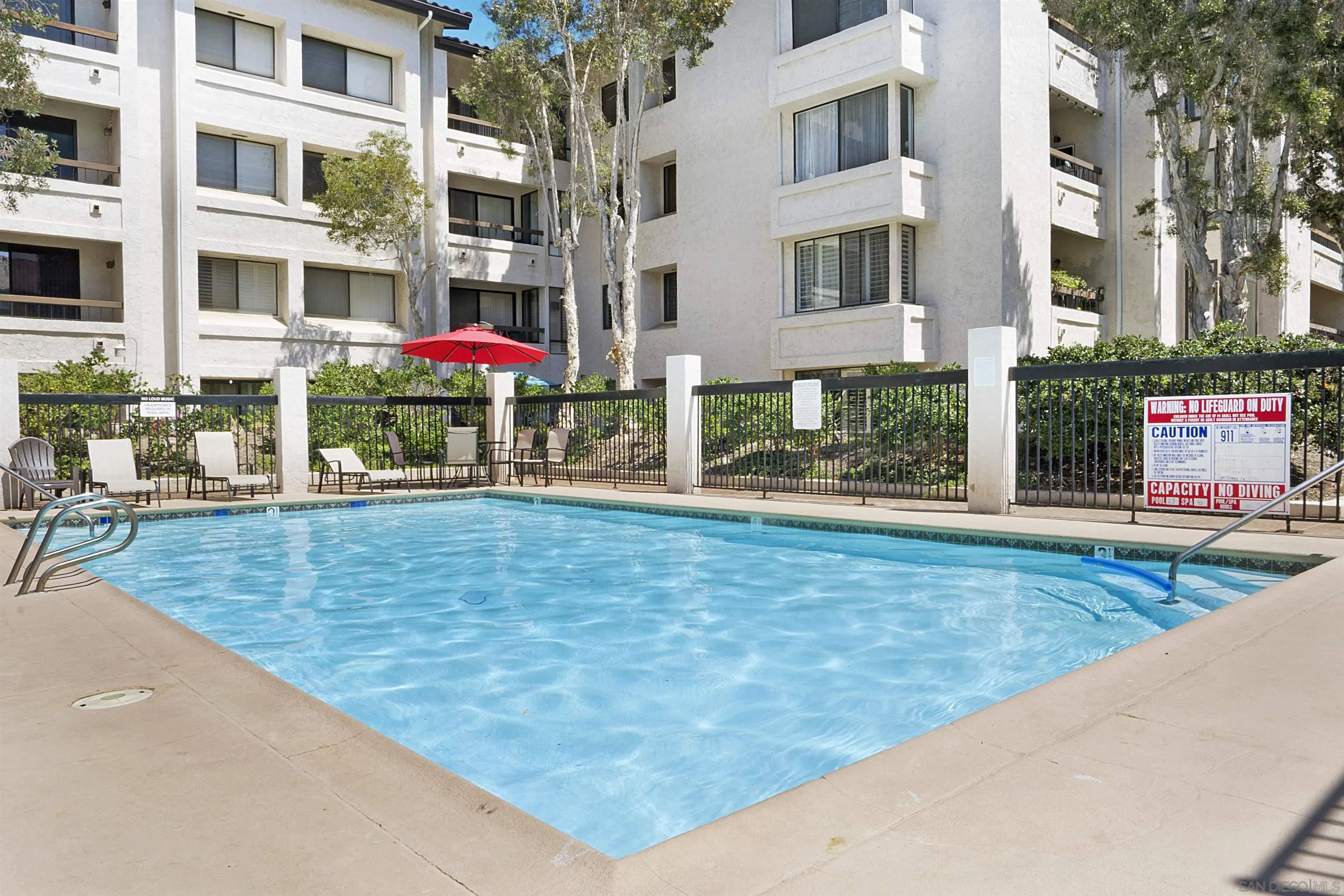 5605 Friars Road, Unit 304 San Diego, CA 92110 - Photo 24 of 37 a view of building with an outdoor space