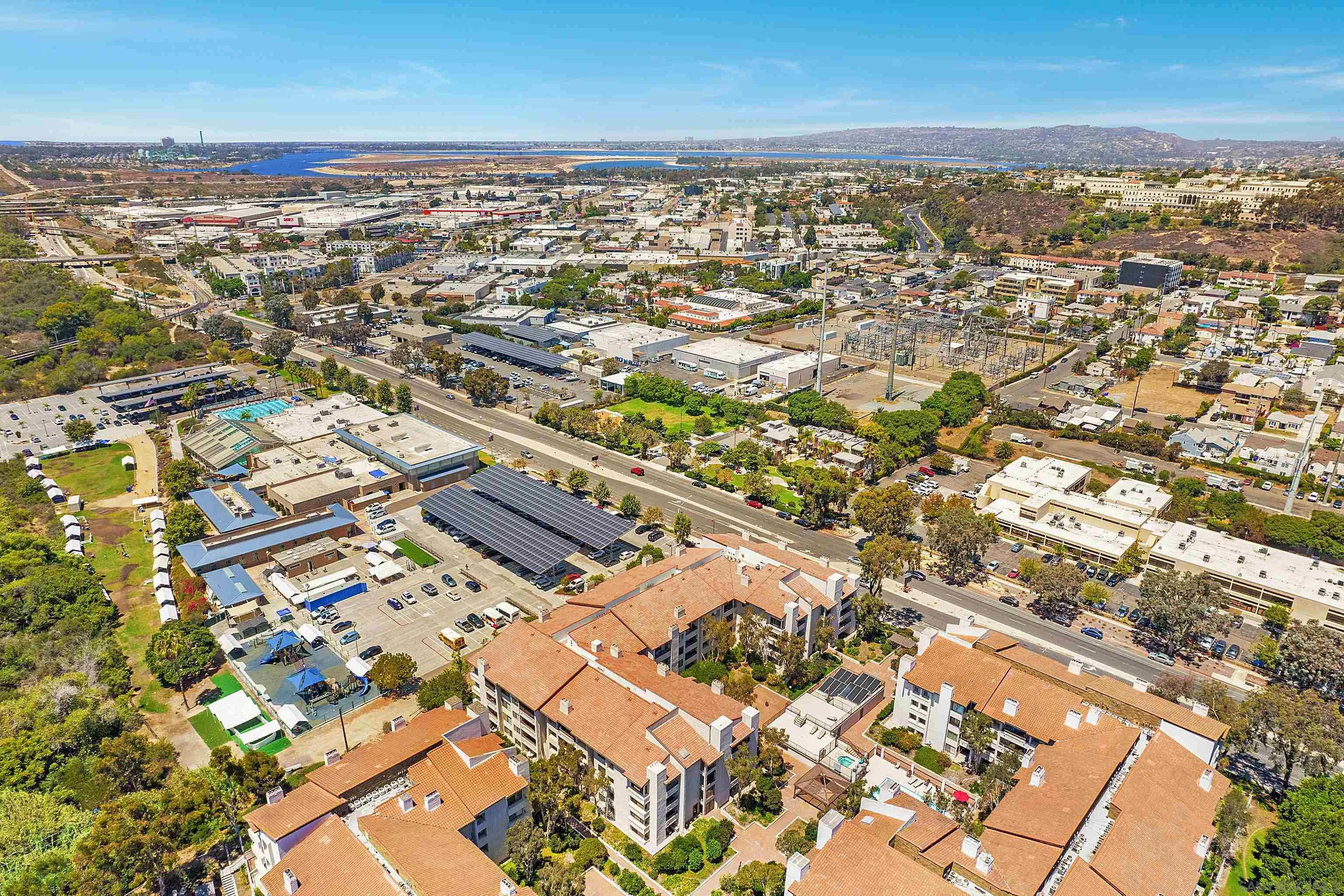 5605 Friars Road, Unit 304 San Diego, CA 92110 - Photo 28 of 37 an aerial view of residential building with parking space