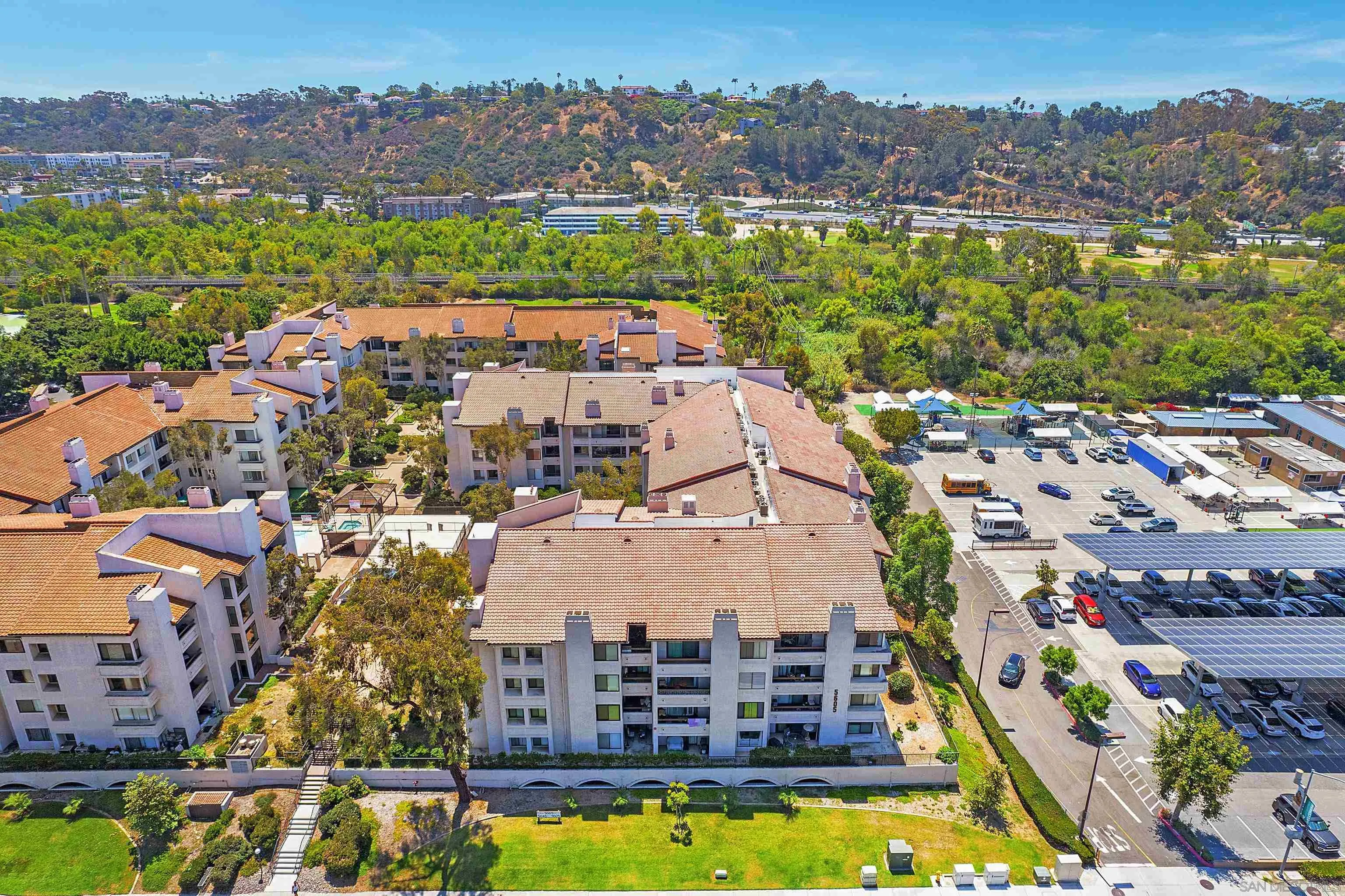 5605 Friars Road, Unit 304 San Diego, CA 92110 - Photo 29 of 37 a view of a city with a lake