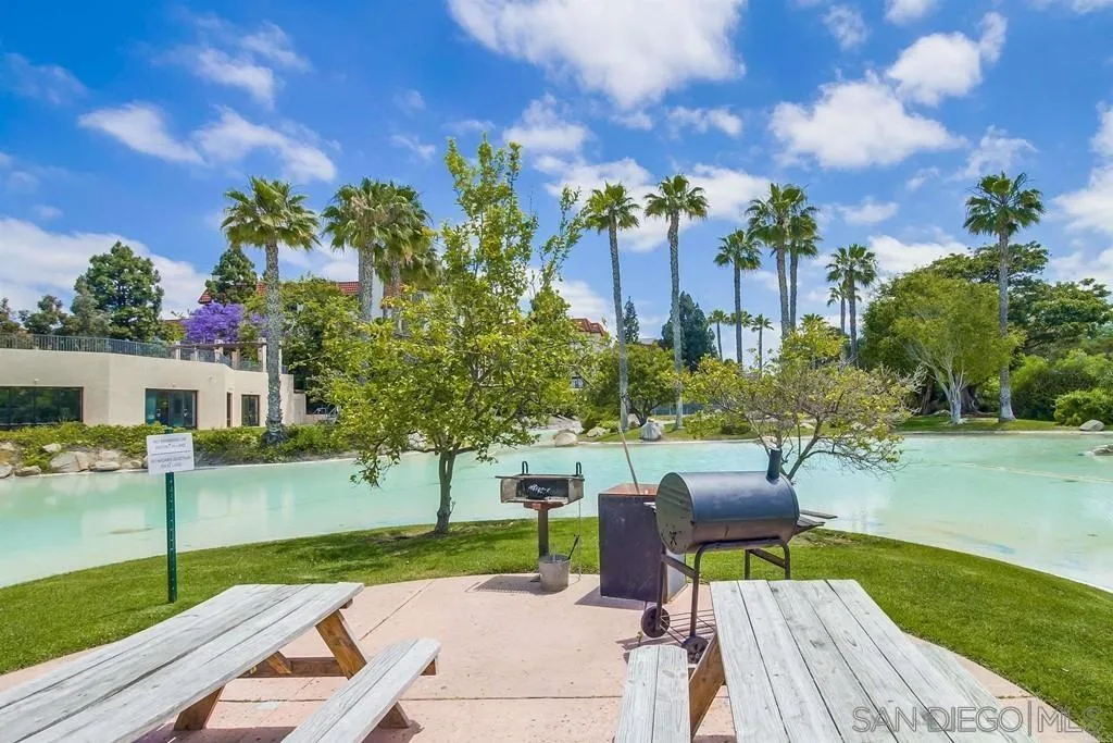 5605 Friars Road, Unit 304 San Diego, CA 92110 - Photo 34 of 37 a view of backyard with seating area and green space