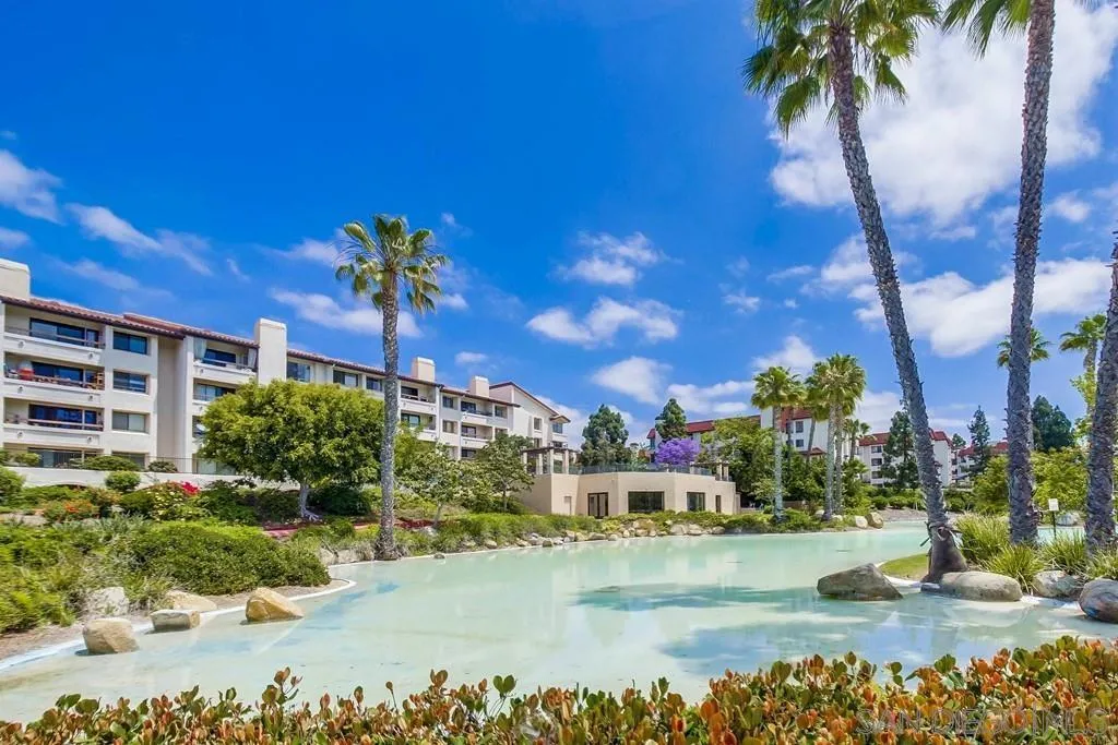 5605 Friars Road, Unit 304 San Diego, CA 92110 - Photo 36 of 37 a view of a lake with a building in the background