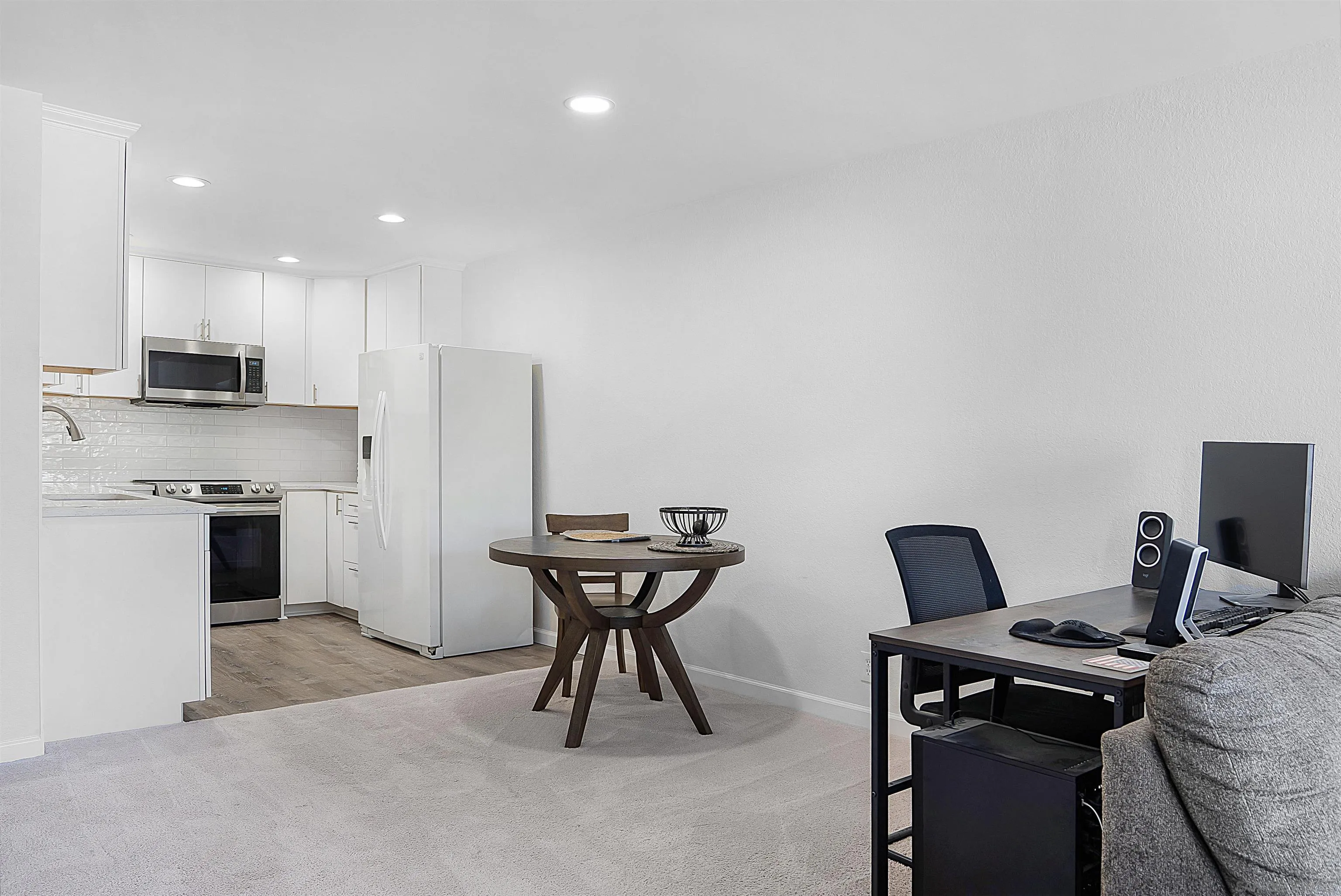 5605 Friars Road, Unit 304 San Diego, CA 92110 - Photo 8 of 37 a view of a workspace with furniture