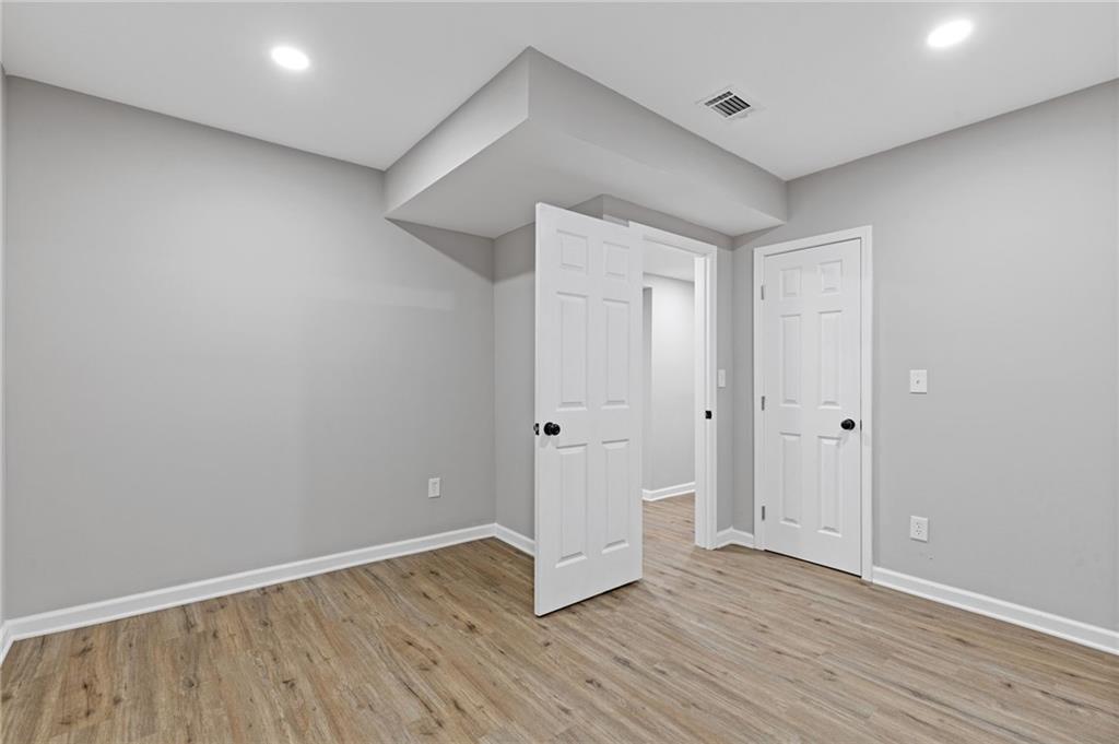 2224 Hudson Drive Southwest Lilburn, GA 30047 - Photo 24 of 30 a view of a livingroom with wooden floor