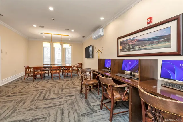 a view of a dining area with furniture and a chandelier
