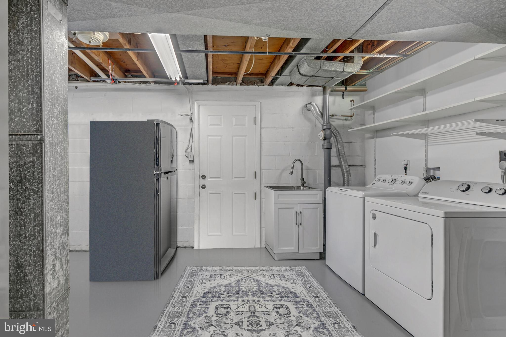 3419 Ramsgate Terrace Alexandria, VA 22309 - Photo 29 of 36 Bright and functional laundry space.