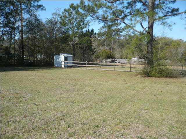 10011 Sunday Road Cantonment, FL 32533 - Photo 9 of 10 OPEN BACKYARD WITH PLENTY OF ROOM ON .50 OF AN ACRE.