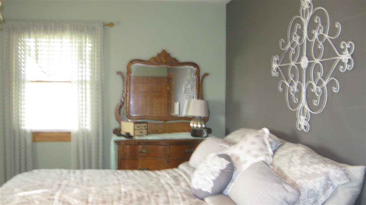 5549 North Stillman Road Stillman Valley, IL 61084 - Photo 13 of 22 a bedroom with a bed and a window